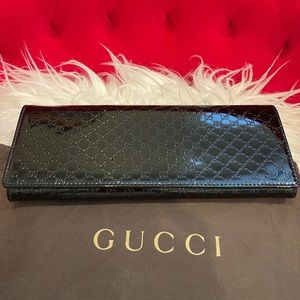 gucci clutch in patent leather